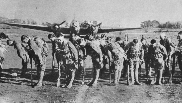 Kamikaze pilots bow to the Emperor before the battle