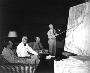 Pres. F. D. Roosevelt in conference with Gen. D. MacArthur, Adm. Chester Nimitz, Adm. W. D. Leahy, while on tour in Hawaiian Islands. 1944. (Navy) NARA FILE #: 080-G-239549 